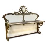 A French Art Nouveau steel and enamel bakery shelf, the scrolling back above a pierced shelf with