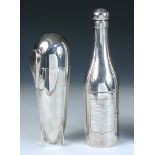 Two 20th century novelty cocktail shakers, the first French, modelled as a champagne bottle, the '