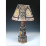 Quentin Bell, a Fulham Pottery figural lamp base and painted shade, the central column with two