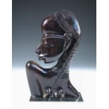 A Hagenauer ebonised bust of an African figure, modelled as a female to one side and as a male to