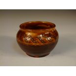 A St Ives pot, possibly by Norah Braden, a band of incised decoration to the yellow rim, impressed