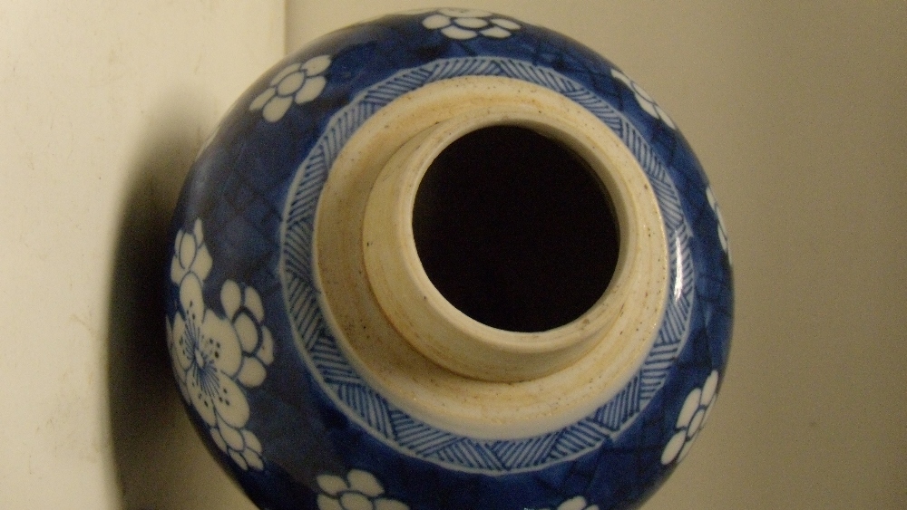 A blue and white jar with wood cover, period of Kangxi, the rounded sides painted with groups of - Image 3 of 3