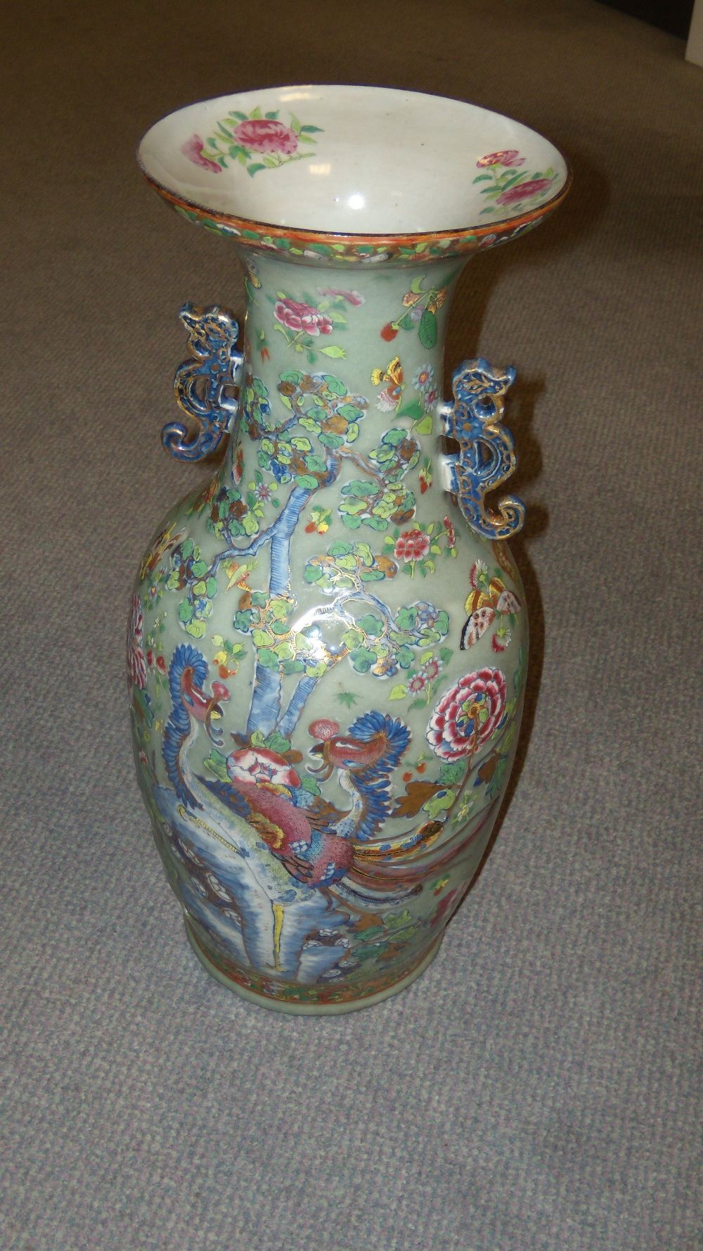 A 19th century Canton celadon ground vase, the neck with two dragon handles above a court scene - Image 2 of 3