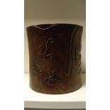 A huang huali brush pot, the four petal shaped panels on the exterior carved in low relief with