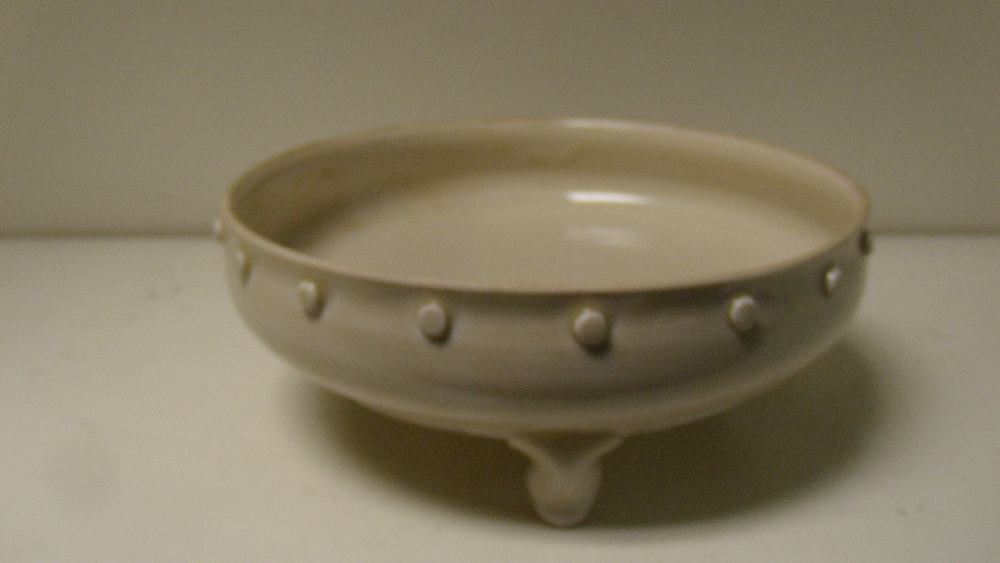 A Song dynasty dingyao censer, the interior incised with lotus, the circular rim exterior studded