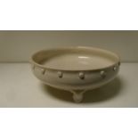 A Song dynasty dingyao censer, the interior incised with lotus, the circular rim exterior studded