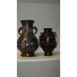 Two late 19th/early 20th century champleve enamelled bronze vases, the baluster shape of the