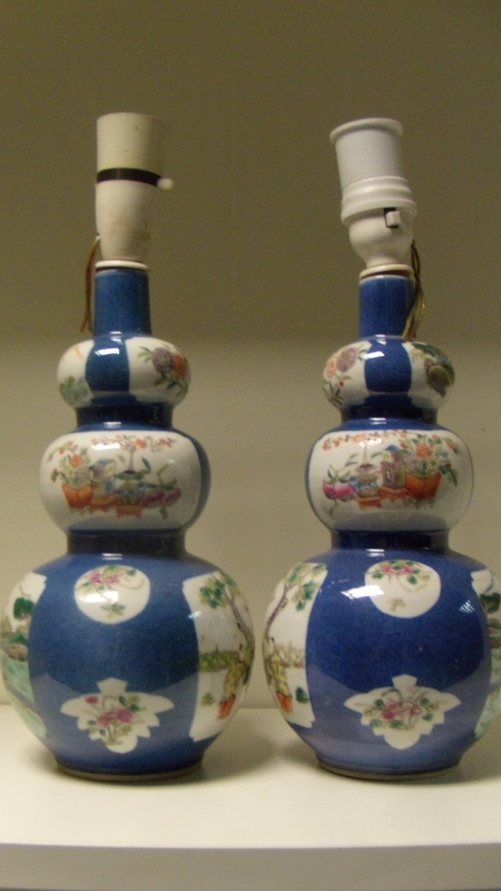 A pair of late 19th/early 20th century famille verte double gourd vases, the triple lobed bodies - Image 2 of 3