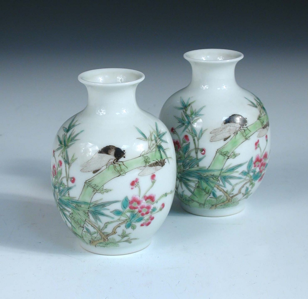 A pair of Republic period vases, each painted with two insects on a stem of bamboo amongst