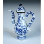 A miniature blue and white ewer and cover, period of Kangxi, the handle and spout of the baluster