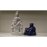 A 19th century blanc de Chine figure of Guanyin and a Guangdong Budai, Guanyin enthroned on a