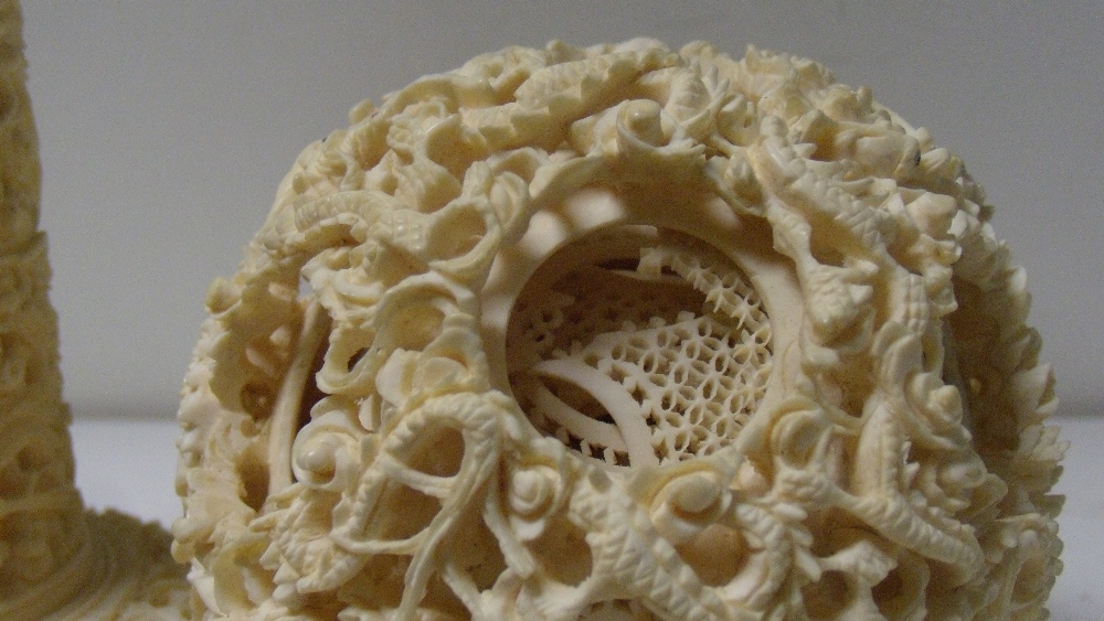 A late 19th/early 20th century ivory ball within ball carving and stand, the exterior of the ball - Image 2 of 2