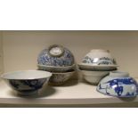 Eight provincial Chinese transitional blue and white bowls, one pair painted with a stylised hare