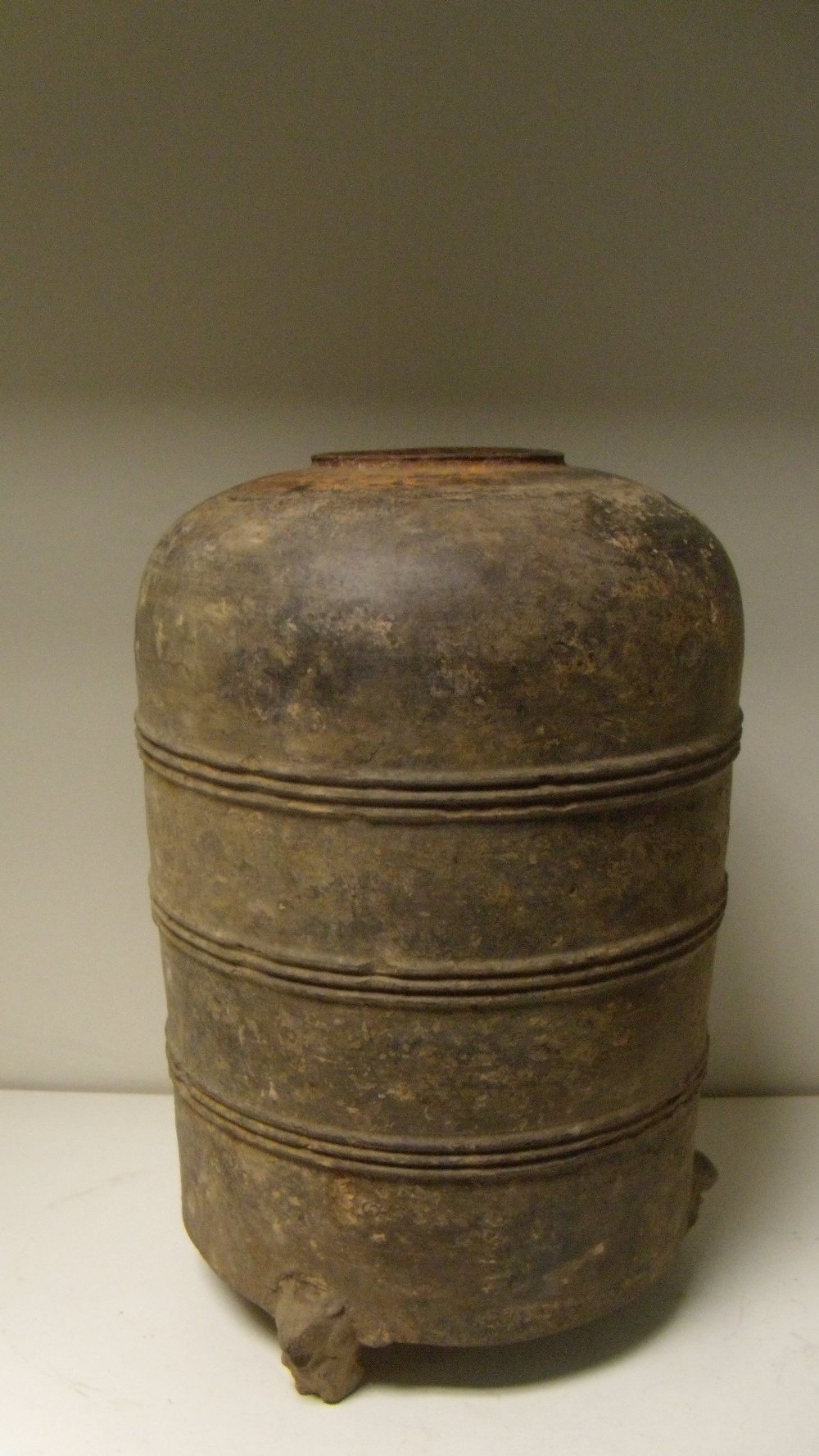 A Han grey pottery granary jar, the rim central to broad rounded shoulders, the tapering cylindrical - Image 2 of 4