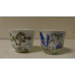 A pair of month cups, six character marks of Kangxi in blue, the exterior of the bell shapes painted