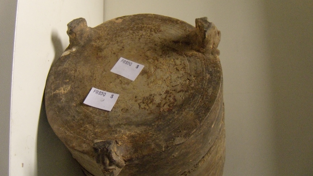A Han grey pottery granary jar, the rim central to broad rounded shoulders, the tapering cylindrical - Image 3 of 4