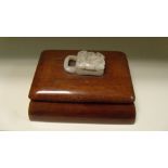 A 19th/20th century hardwood (huang hua li?) box, the rounded rectangular lift off cover applied