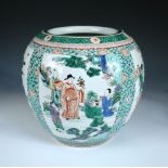 A famille verte jar painted in the Kangxi style with four panels of figures on a cracked ice