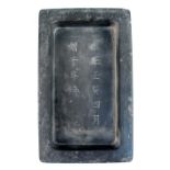 An inkstone bearing Yongzheng mark on the dished underside of the rectangular shape, the upper