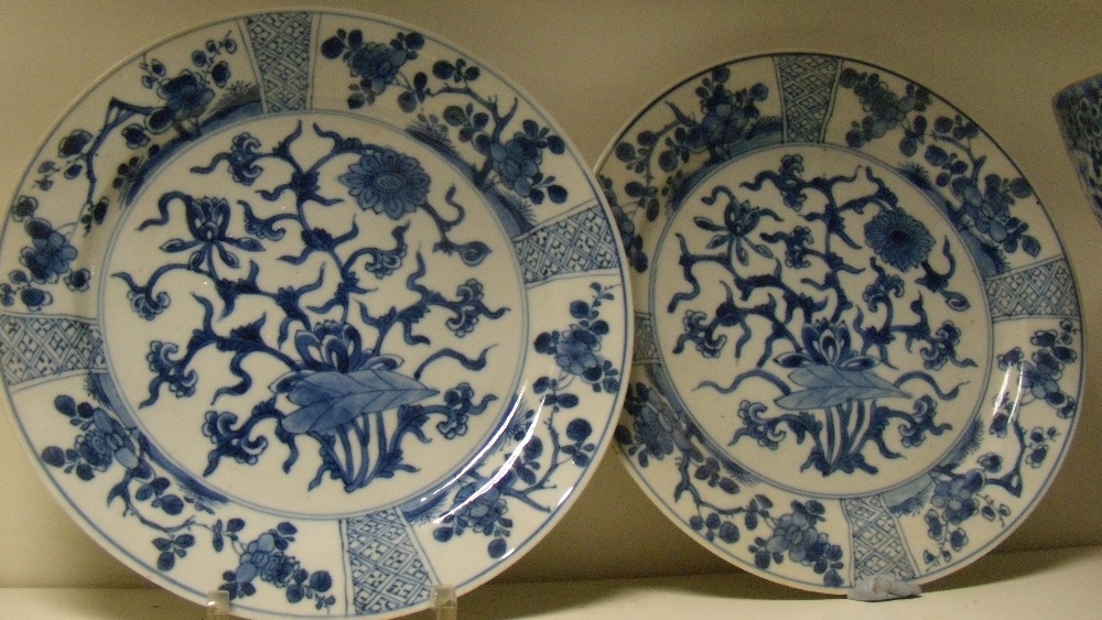 A pair of blue and white plates, period of Kangxi, and a later bowl, the plates painted with central - Image 2 of 5