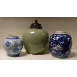 Two late 19th/early 20th century blue and white jars and another celadon, one blue and white jar