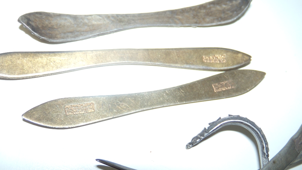 Fourteen hair pins and pieces, two with ornamental ends to pin shafts in white metal, four of - Image 2 of 3