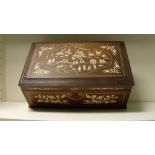 A late 19th/early 20th century bone inlaid box, the hinged rectangular lid with figures about a
