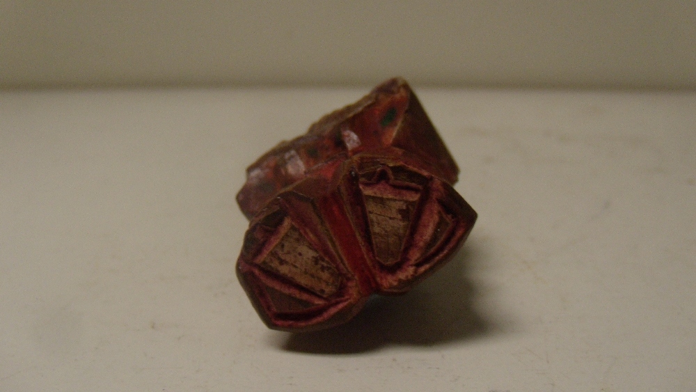 A Nara ningyo ittabori netsuke depicting a Noh actor standing holding a fan, the soft wood painted - Image 3 of 3