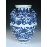 A Ming style blue and white vase, four character mark of Kangxi, the dragon handles on the shoulders