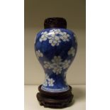 A blue and white meiping, period of Kangxi, painted with groups of spring cherry blossoms resting on