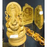 A Chinese carved wood ruyi sceptre and two Indian carved wooden groups depicting Ganesh (3)