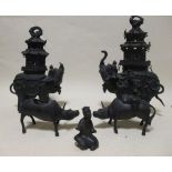 A pair of Indian bronze Elephant figures with howdahs and a pair of Indian bronze cows and riders (