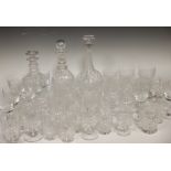 A quantity of cut glasses, and decanters, including several wine glasses with building designs