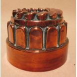 A copper crown jelly mould