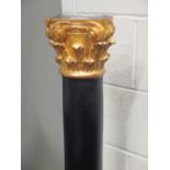 WITHDRAWN A black painted and gilt torchere in the form of a Corinthium column, 114cm high