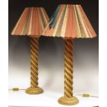 A pair of oak twist carved table lamps (2)