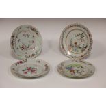 Four various 18th century Chinese famille rose plates (one restored)