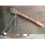 A Congolese prestige axe, possibly Sonye, with snakeskin handle and a wooden carving of two