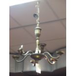 A brass ceiling light, together with another similar and other wall lights