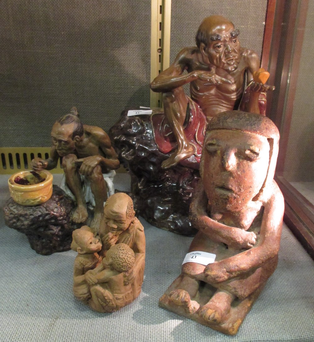 A Precolumbian red pottery figure, two Guangdong figures and another from Africa (4)