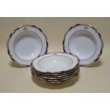 A set of eight Copeland Spode blue and gilt decorated armorial plates, 27cm diameter