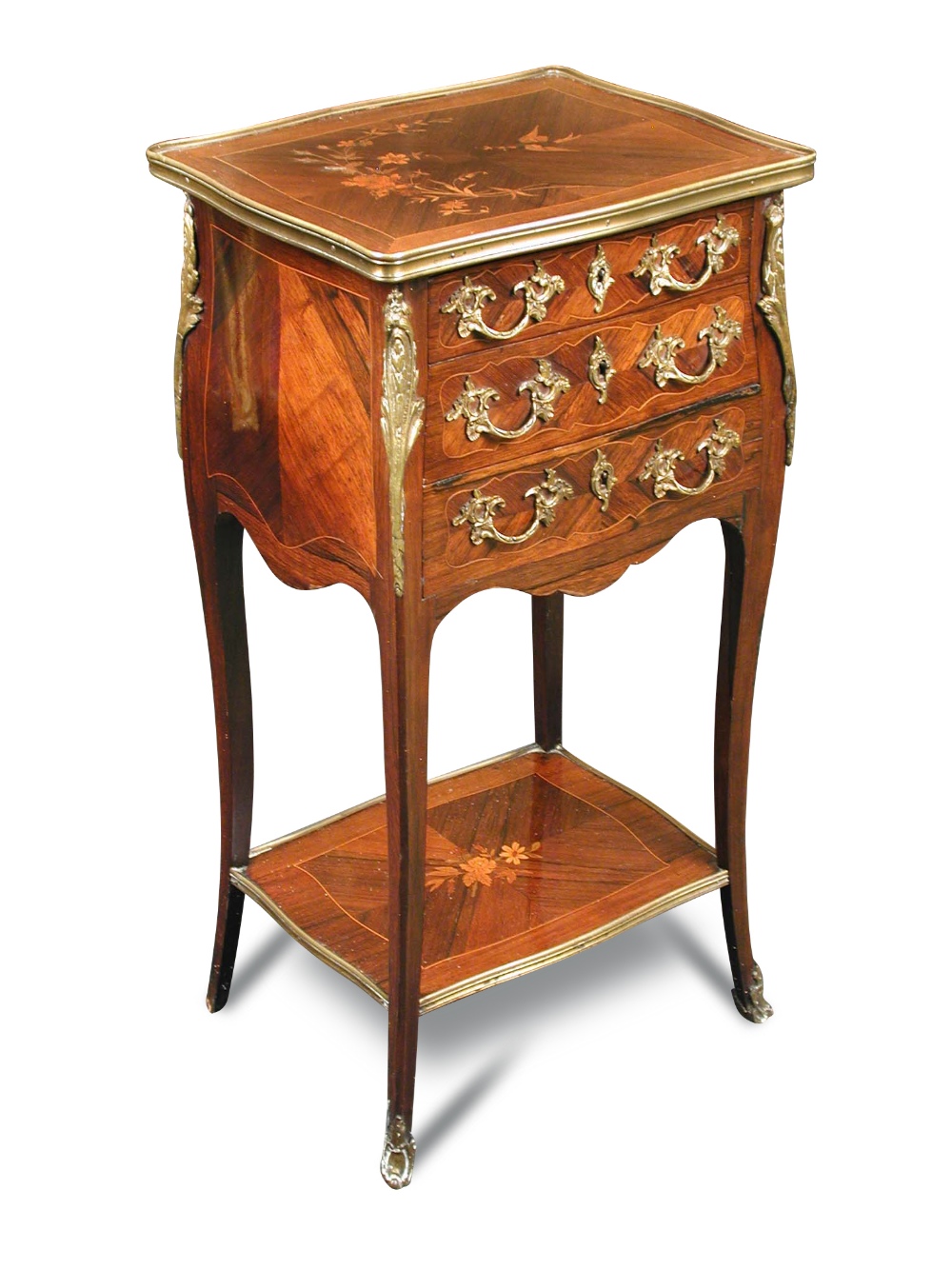 A Louis XV revival rosewood and gilt mounted table ambulante, of serpentine outline with floral