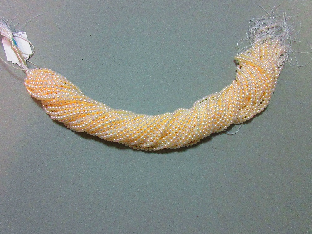 A skein of thirty six strings of 4mm cultured pearls, each string 40.5cm long (one string of - Image 2 of 3