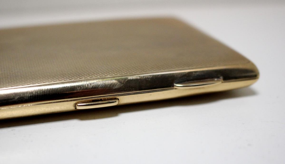 A 9ct gold pocket cigarette case, by S Blackensee & Co, Birmingham 1914, rectangular, engine turned, - Image 2 of 5