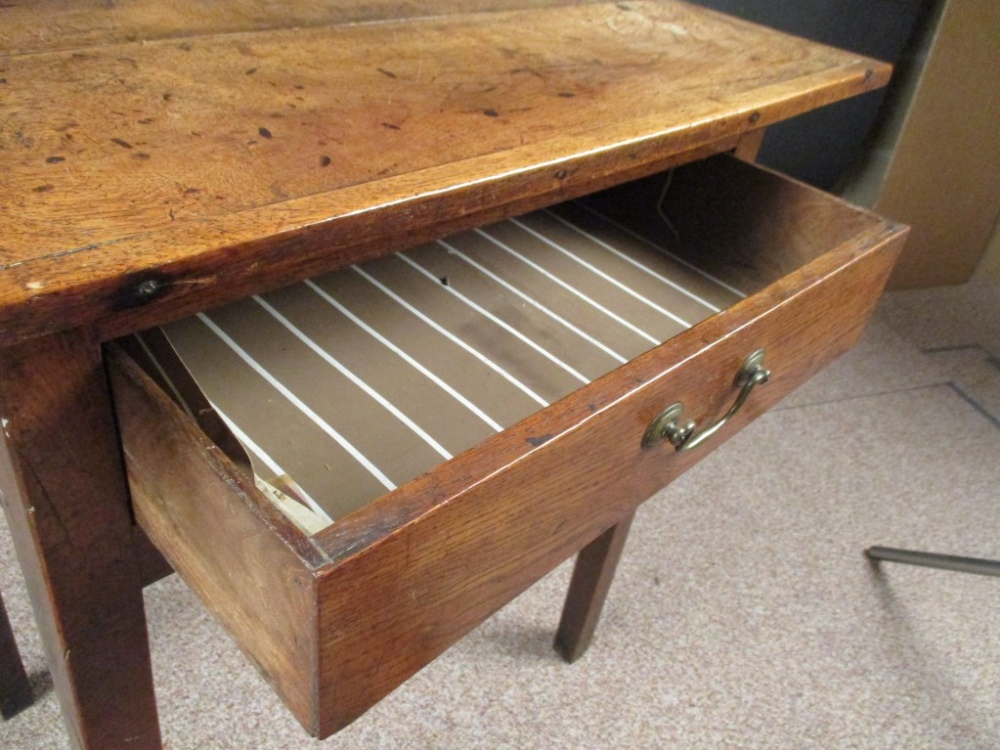 An 18th century oak side table, a patinated cleated plank top with single drawer, on tapering square - Image 3 of 4