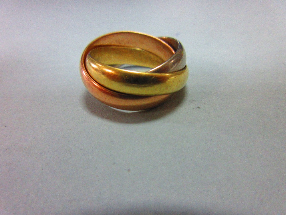 An 18ct three colour gold 'Russian wedding' ring, the three interlocking plain D-section bands, - Image 5 of 5