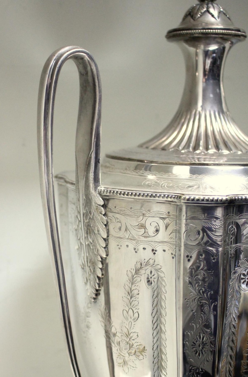 A Victorian electroplate tea urn in the neo-classical style, unmarked, the vase shaped body engraved - Image 5 of 7