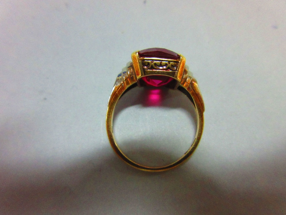 An Austrian single stone synthetic red spinel ring, the fancy cut rectangular pinky-red spinel, claw - Image 5 of 8