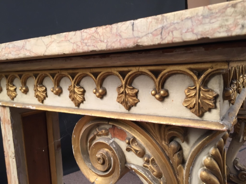 An early 19th century parcel gilt and marble console table, a veined marble top on an ivory - Image 3 of 9