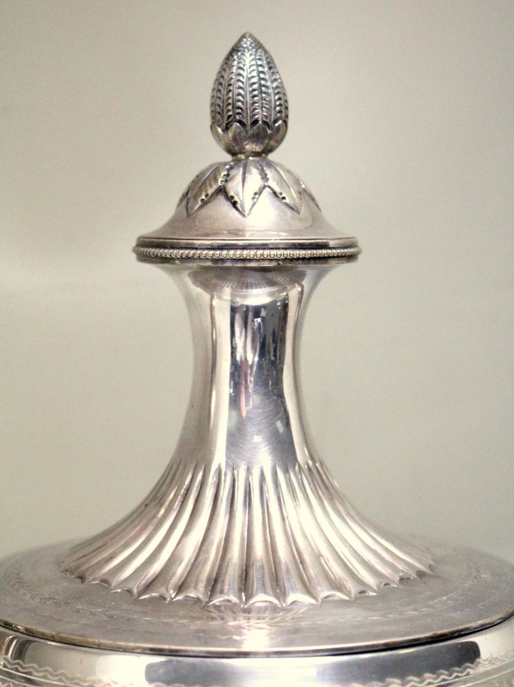 A Victorian electroplate tea urn in the neo-classical style, unmarked, the vase shaped body engraved - Image 4 of 7